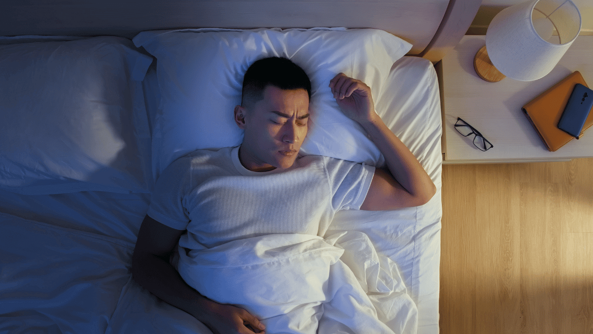 A man experiencing non-restorative sleep in men and persistent daytime fatigue.